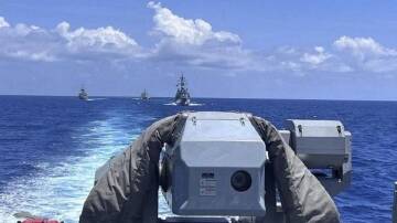Australia, the US, Japan and the Philippines held naval exercises in the South China Sea in April. (AP PHOTO)