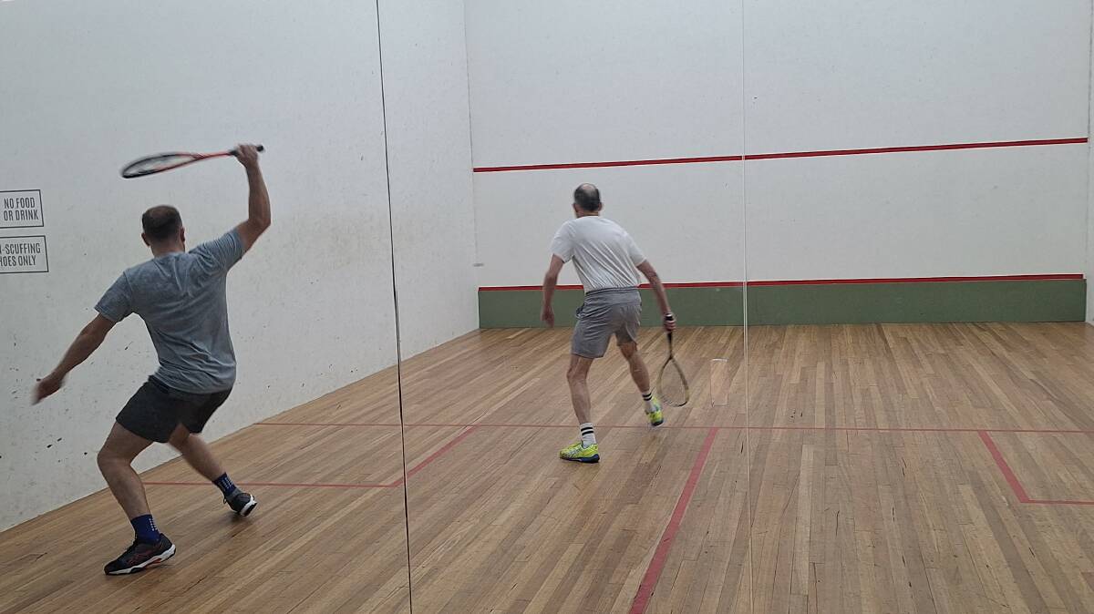 Tuesday Social - Gaston Cara playing the backhand cross court while Mark Rikard-Bell watches on. Picture supplied