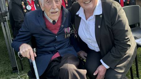 Singleton's last surviving WW2 veteran Graham Curtis with Ruth Rogers at today's main Anzac Day service in Burdekin Park.