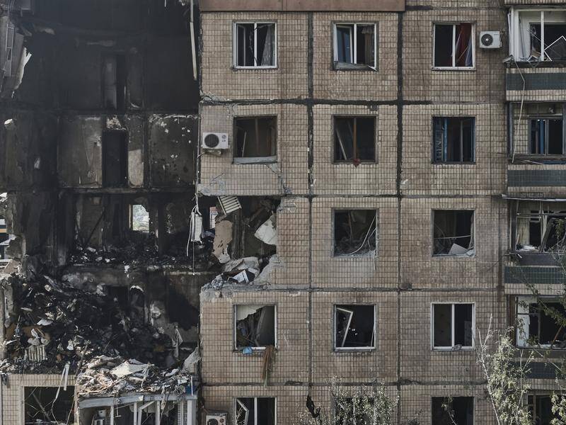 A missile strike on a nine-storey residential building killed six people, Ukrainian officials say. (AP PHOTO)